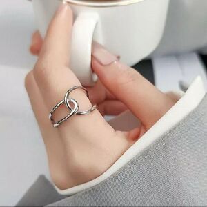 The Loop Ring in 925 silver adjustable sizing.